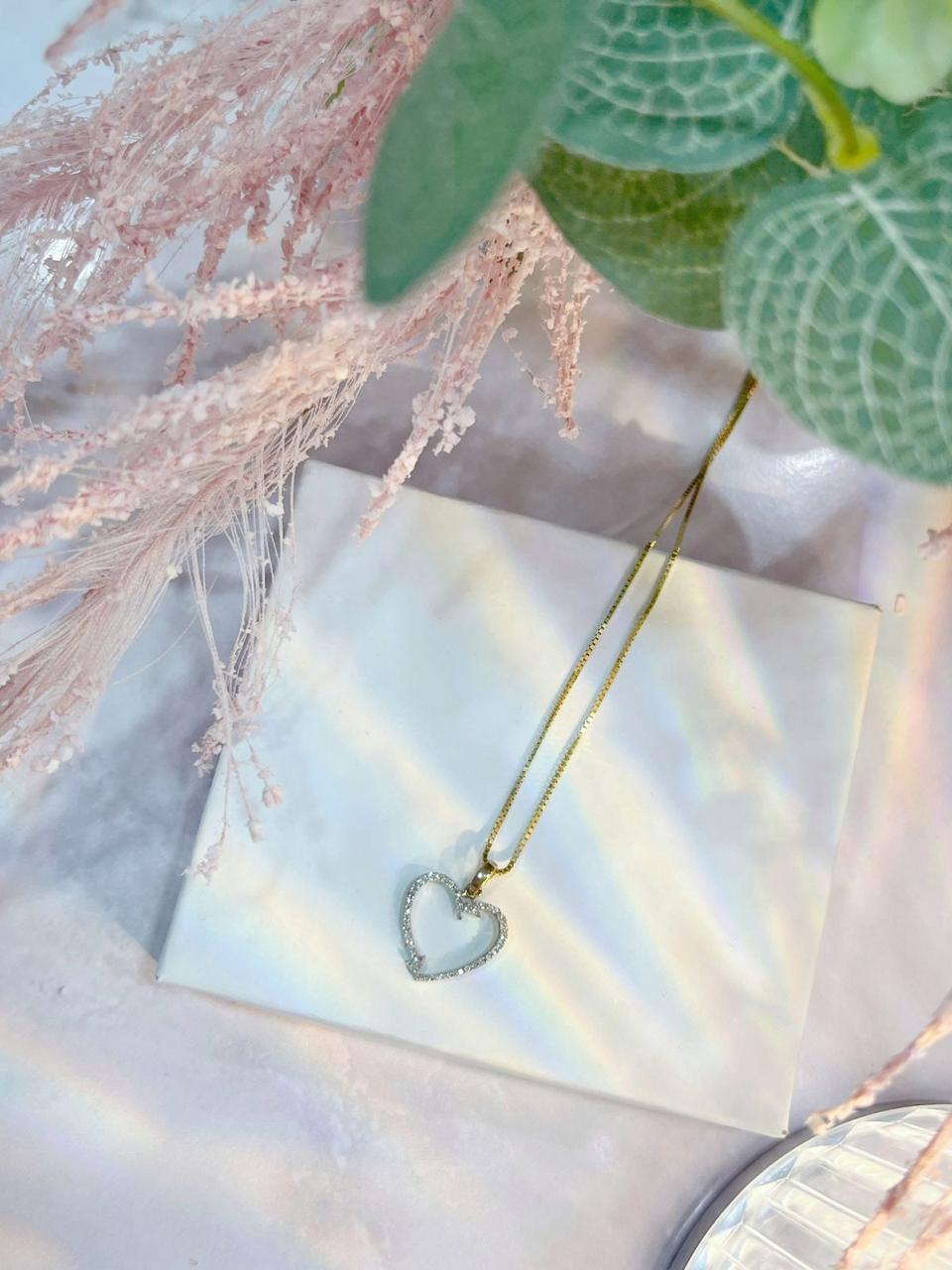 Dije corazon de oro con diamantes