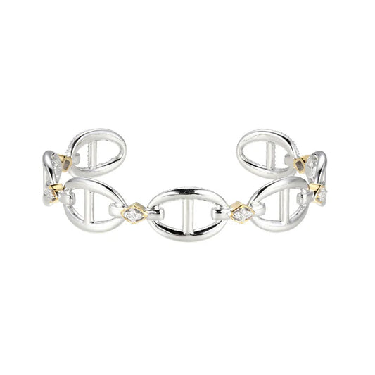 Brazalete Rígido de Plata con Circonias y Acabado en Oro de 18K y Rodio